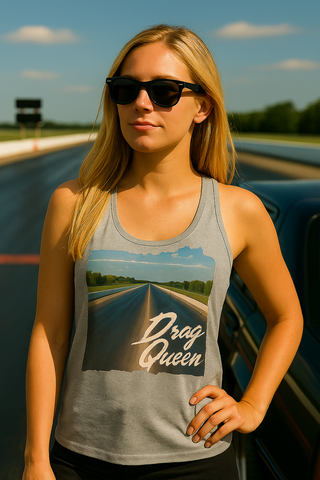 Blonde woman wearing gray Drag Queen women’s racerback tank top with drag strip graphic, sunglasses, standing at racetrack